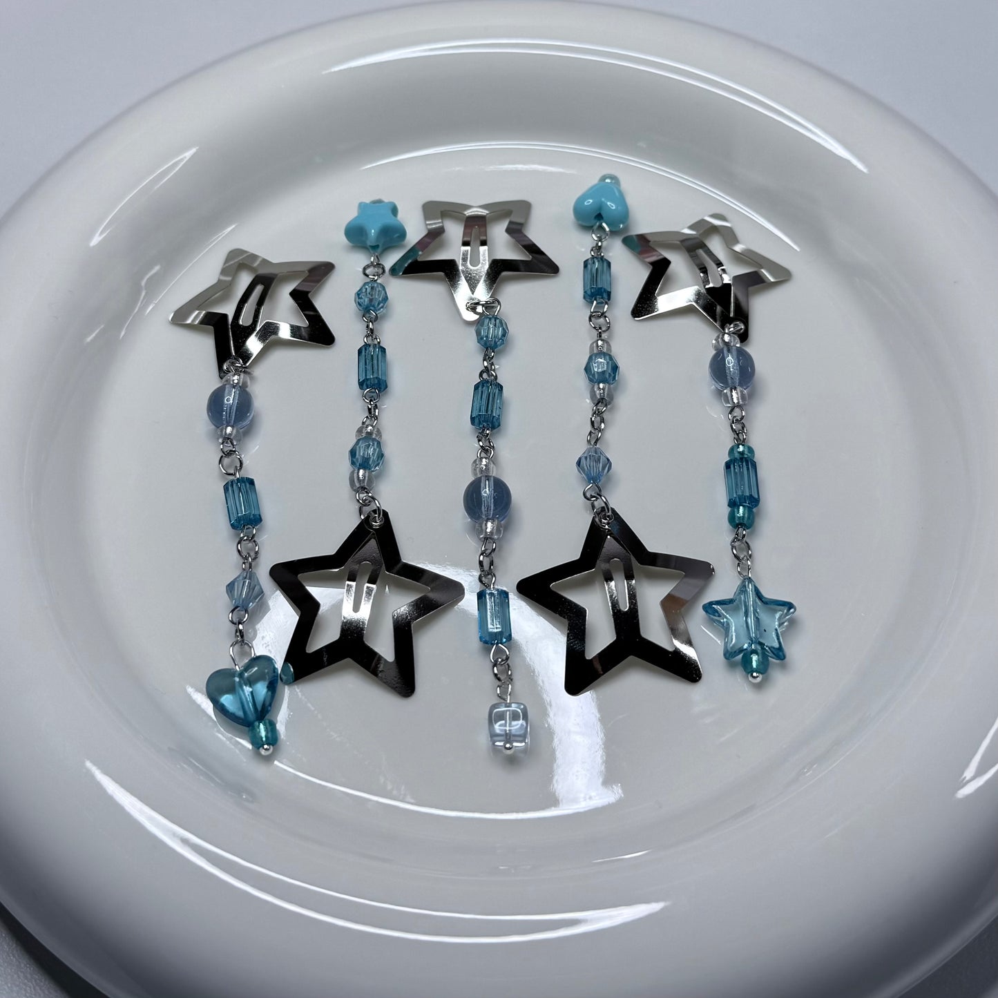 SET OF FIVE BEADED STAR CLIPS