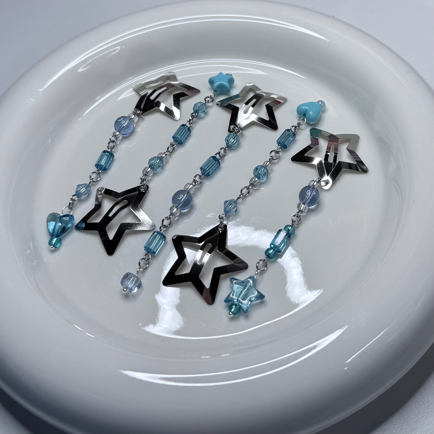 SET OF FIVE BEADED STAR CLIPS