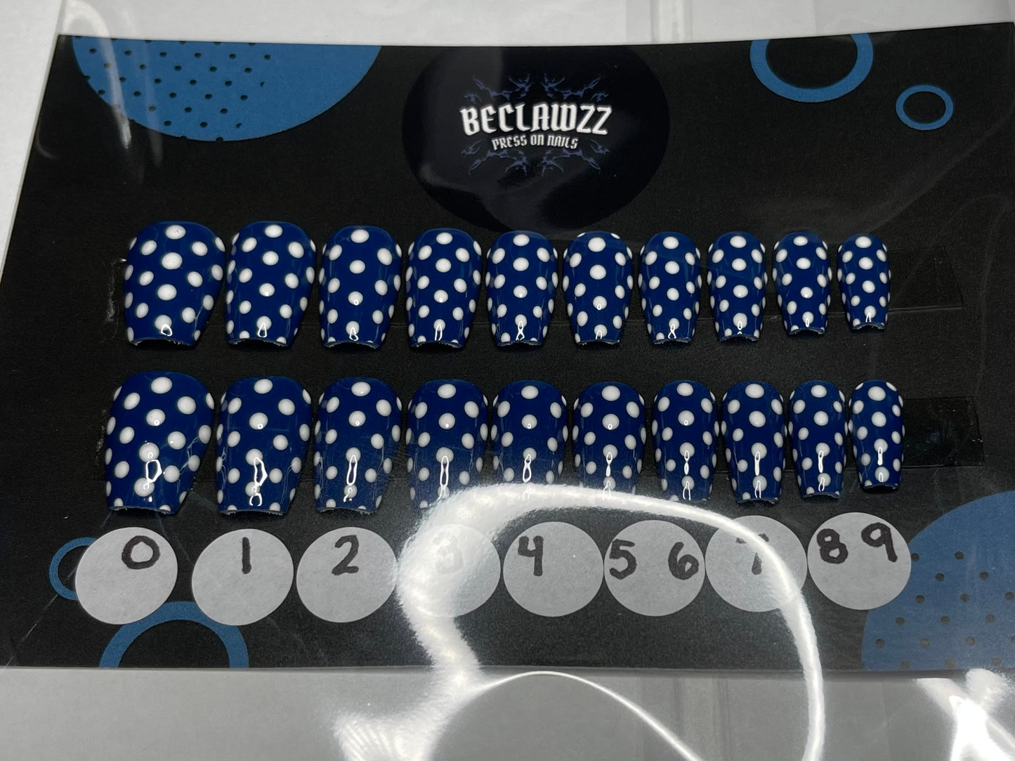 ONE SIZE FITS ALL: NAVY POLKA DOTS